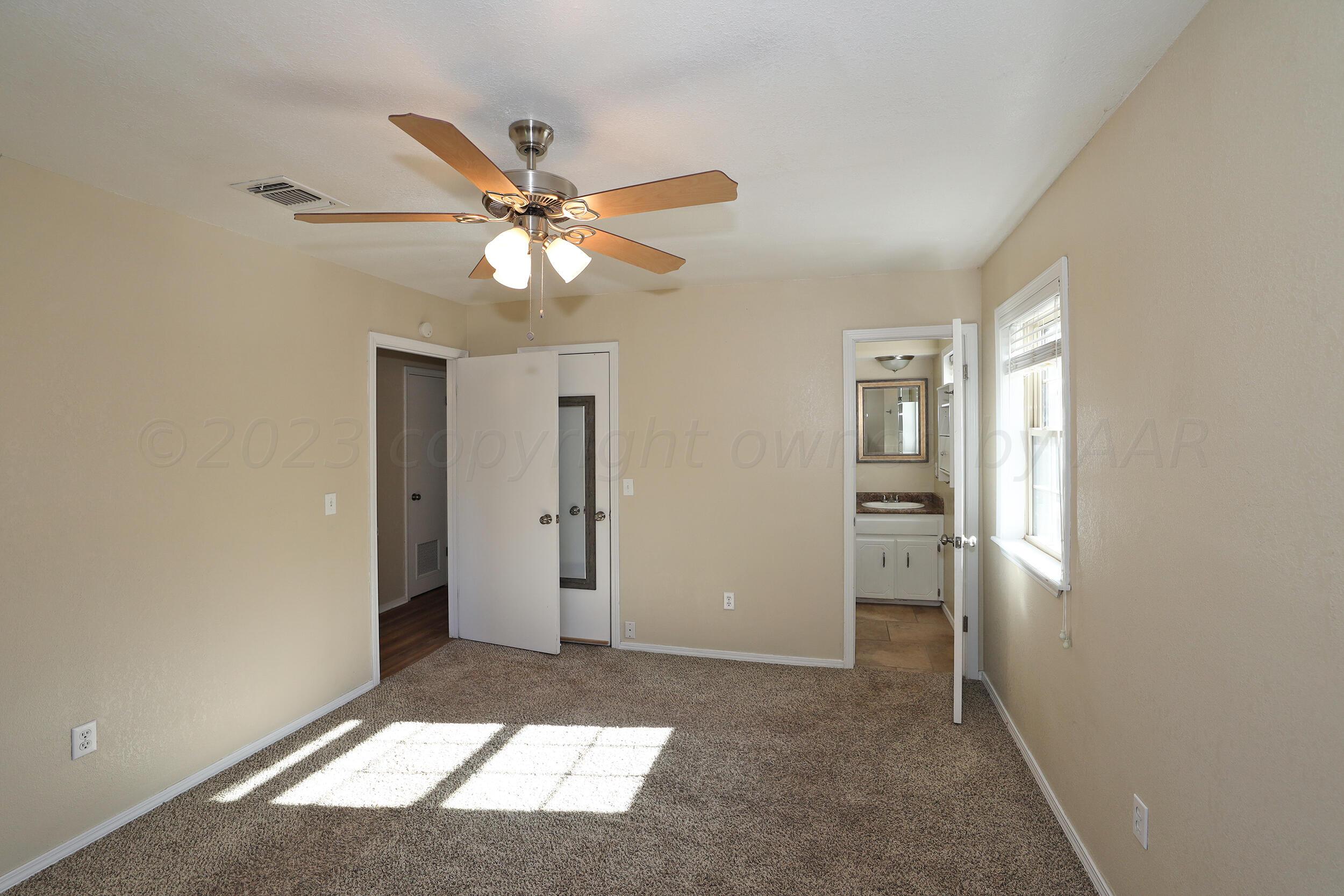 2905 Salem Drive Amarillo, TX 79110 - Photo 15 of 29 a view of entryway and hall with a chandelier fan