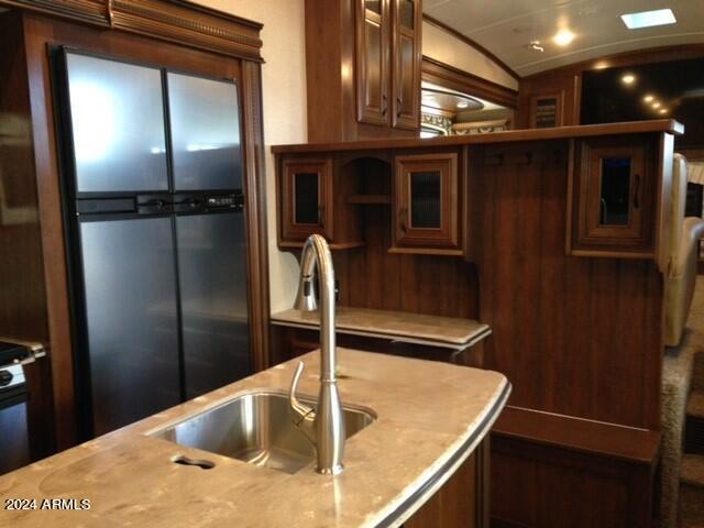 2 County Rd N2331 Nutrioso, AZ 85932 - Photo 19 of 40 a kitchen with a refrigerator and countertop