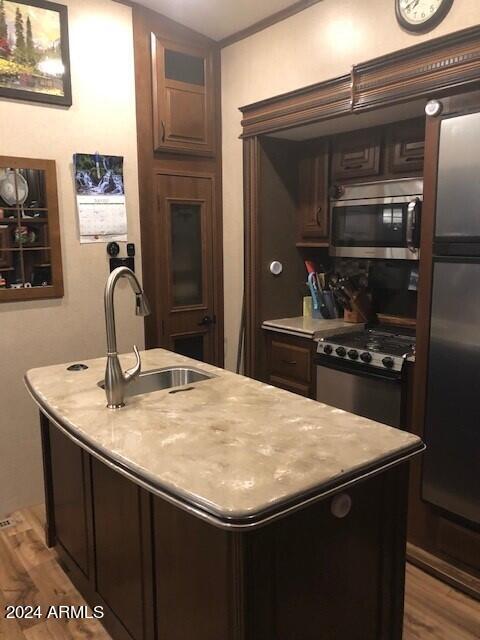 2 County Rd N2331 Nutrioso, AZ 85932 - Photo 20 of 40 a kitchen with granite countertop a sink and stainless steel appliances