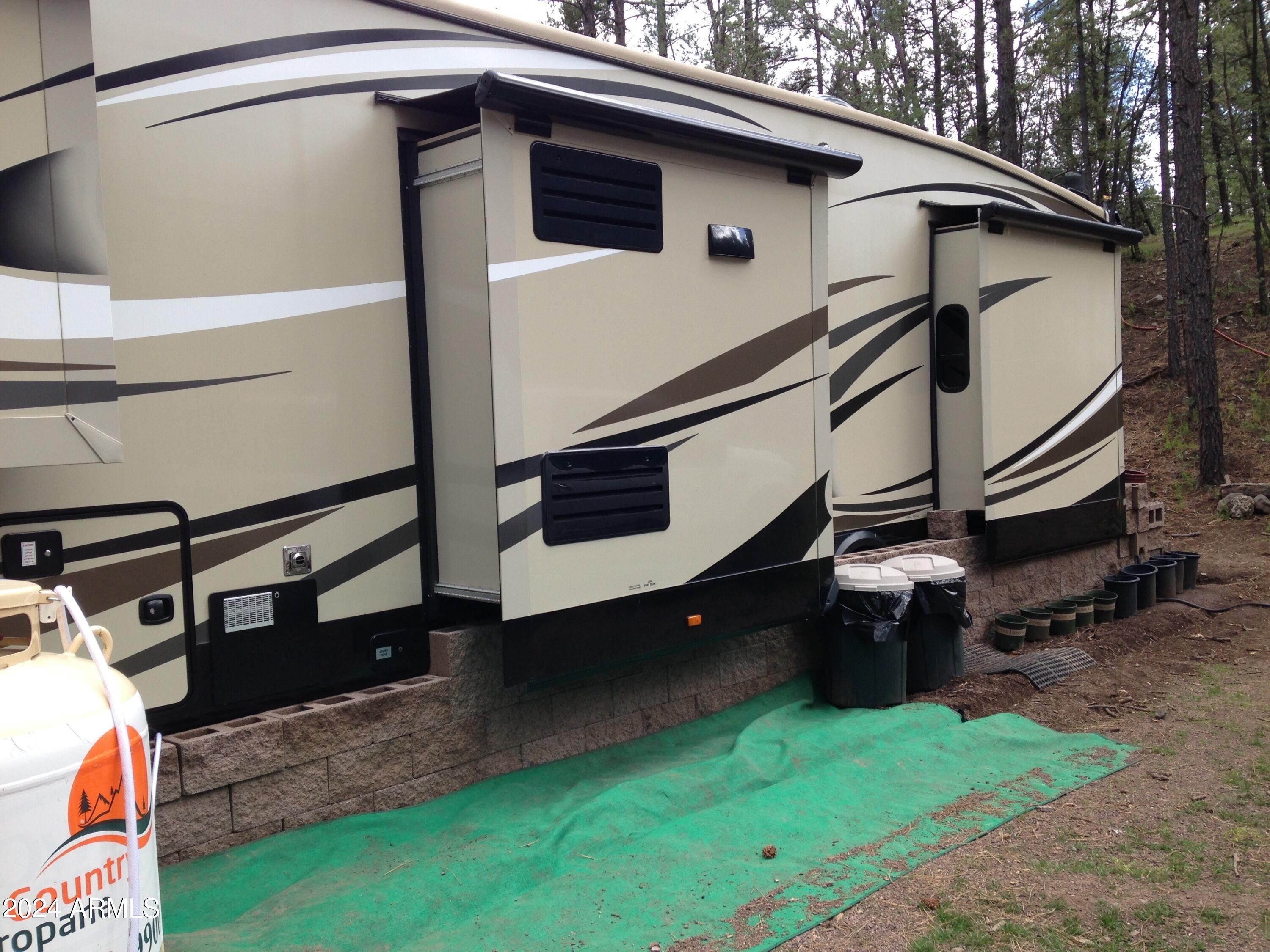2 County Rd N2331 Nutrioso, AZ 85932 - Photo 21 of 40 a view of a house with backyard
