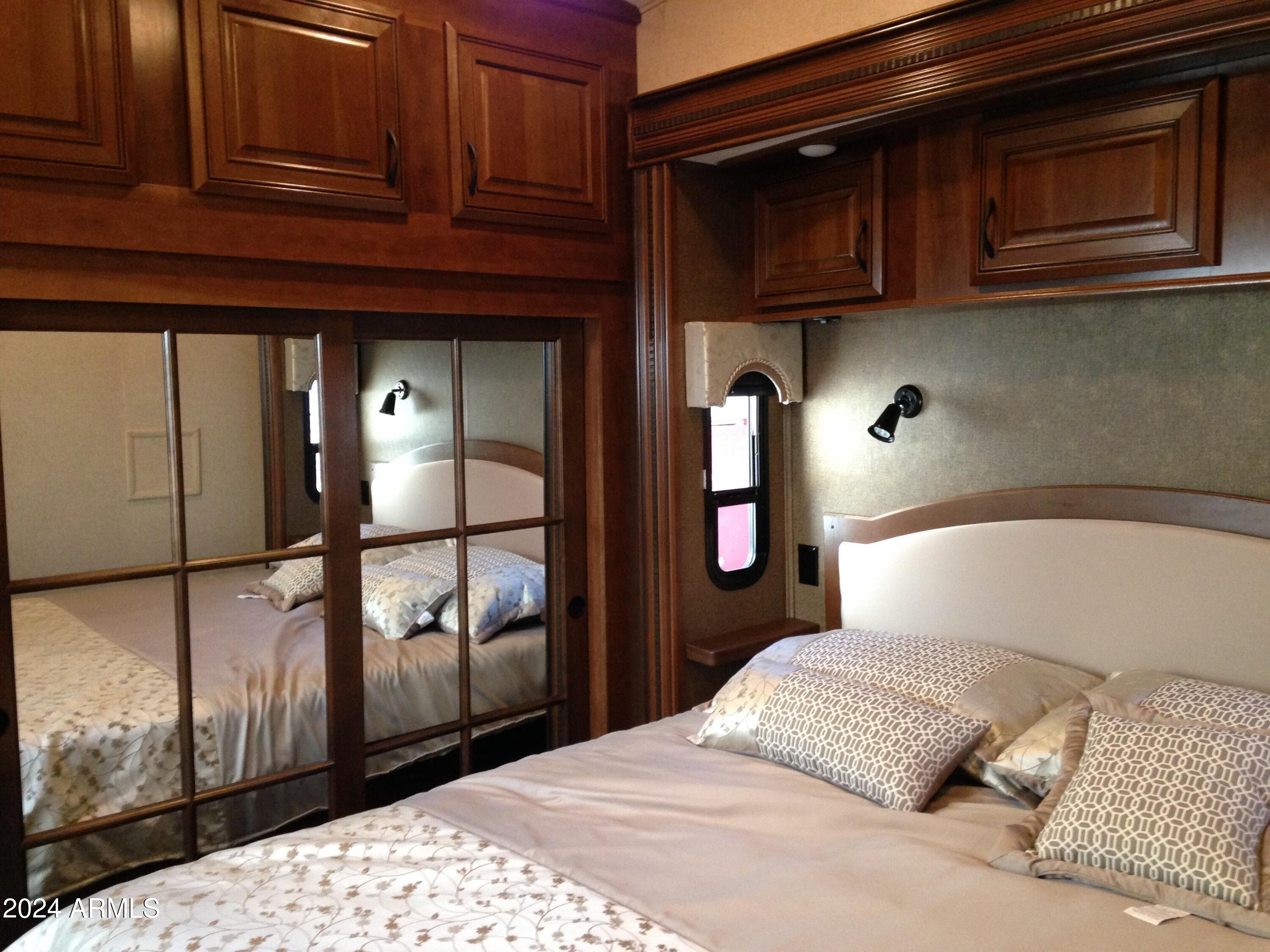 2 County Rd N2331 Nutrioso, AZ 85932 - Photo 23 of 40 a bedroom with a bed and walk in closet