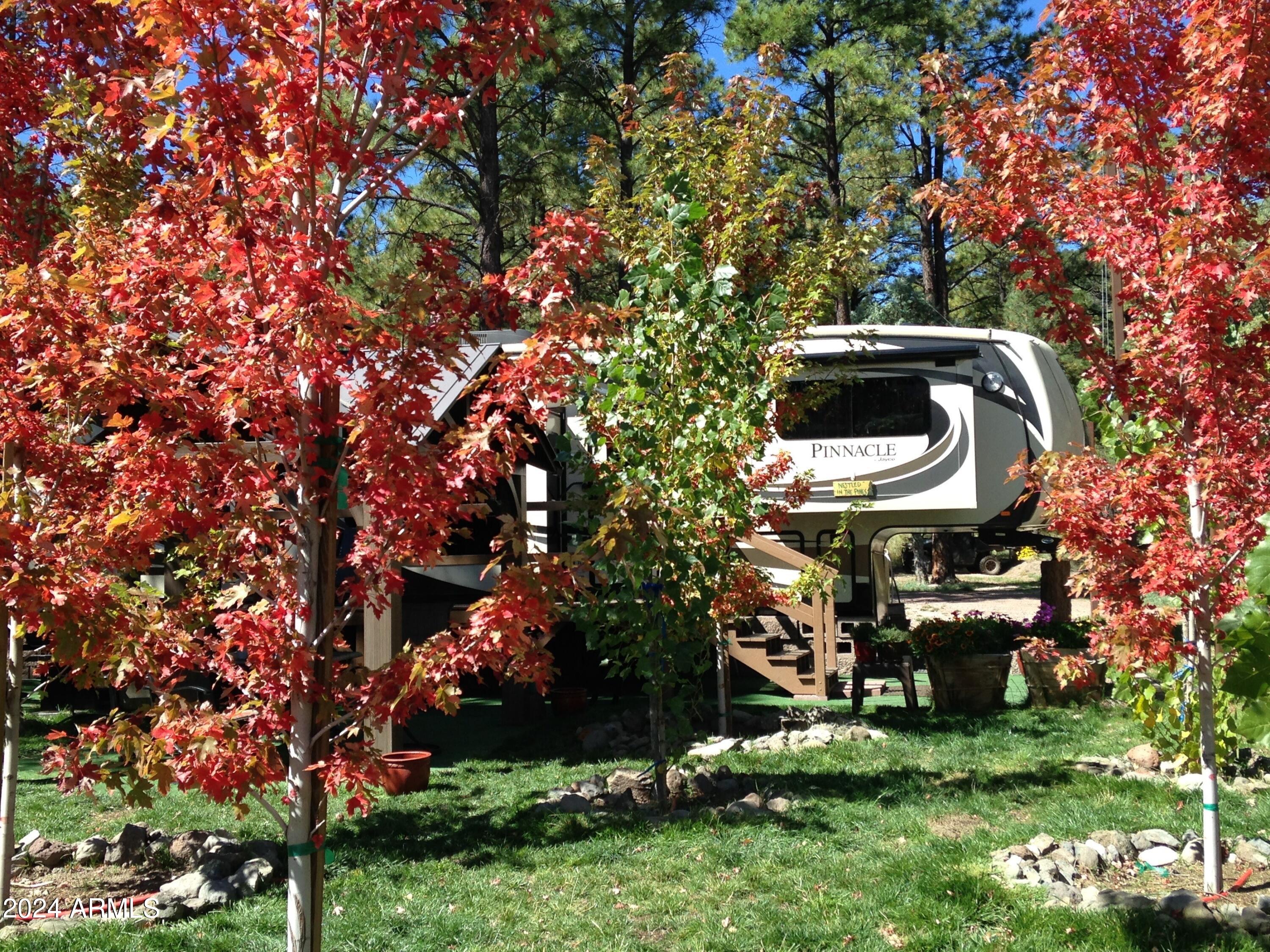 2 County Rd N2331 Nutrioso, AZ 85932 - Photo 10 of 40 a front view of a house with a yard