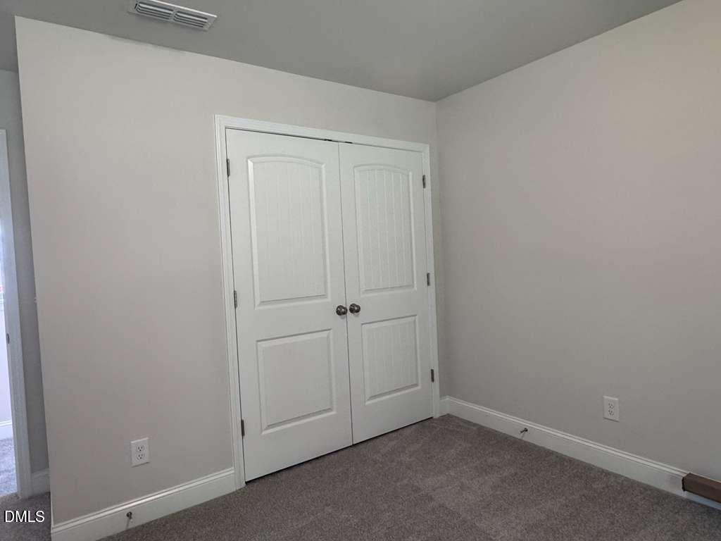 189 Karlov Road Garner, NC 27529 - Photo 29 of 33 Upper Level - Bedroom 4 - Closet