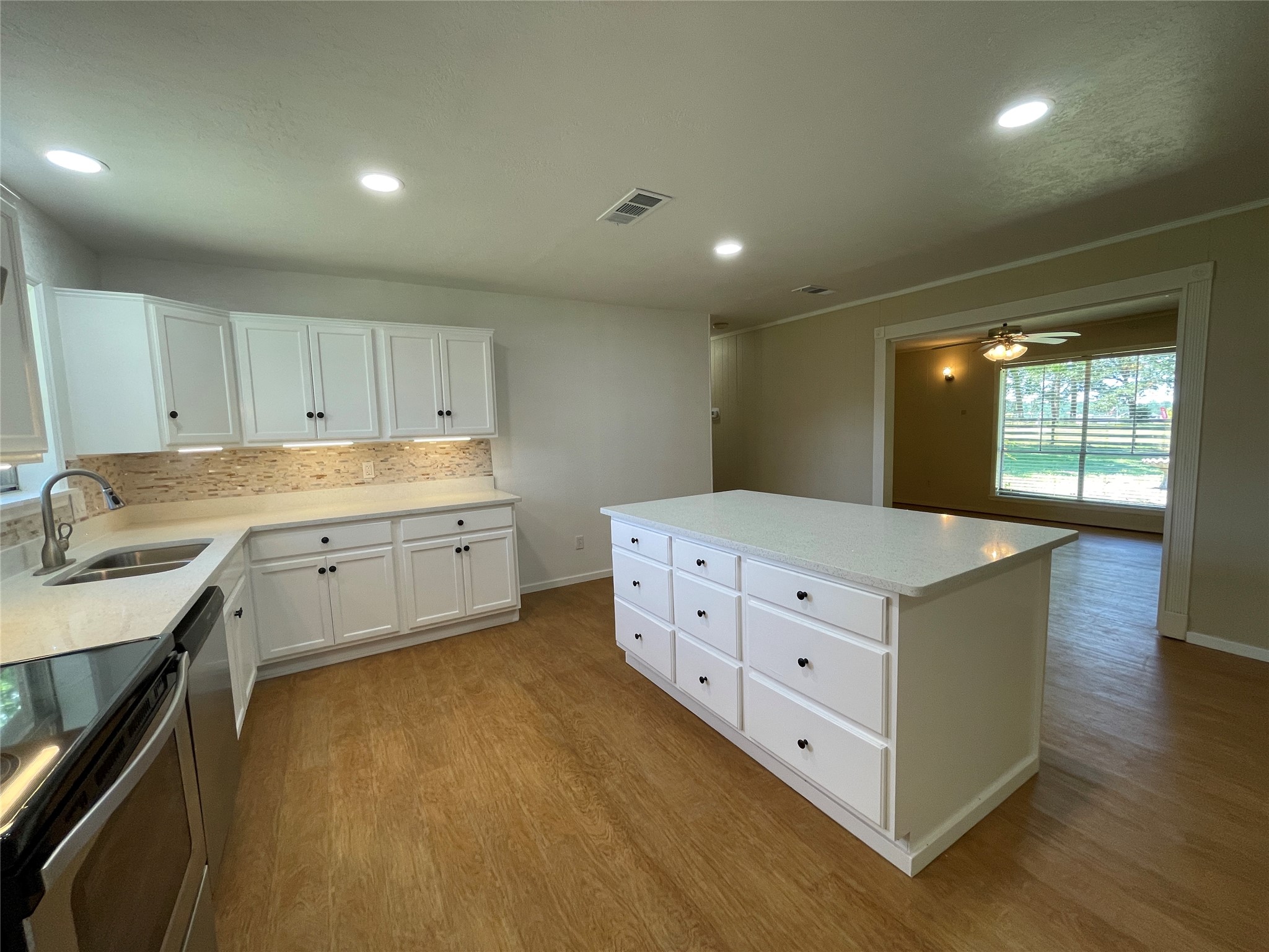 19439 Keenan Cut Off Road Montgomery, TX 77316 - Photo 13 of 39 This inviting kitchen seamlessly connects to a formal dining room