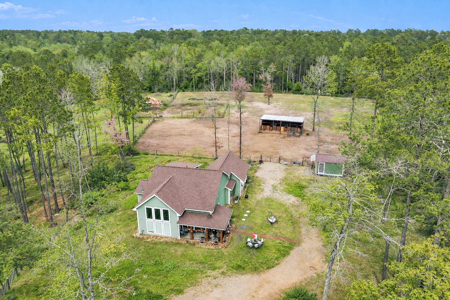 Digitally edited to show spring-like landscaping.