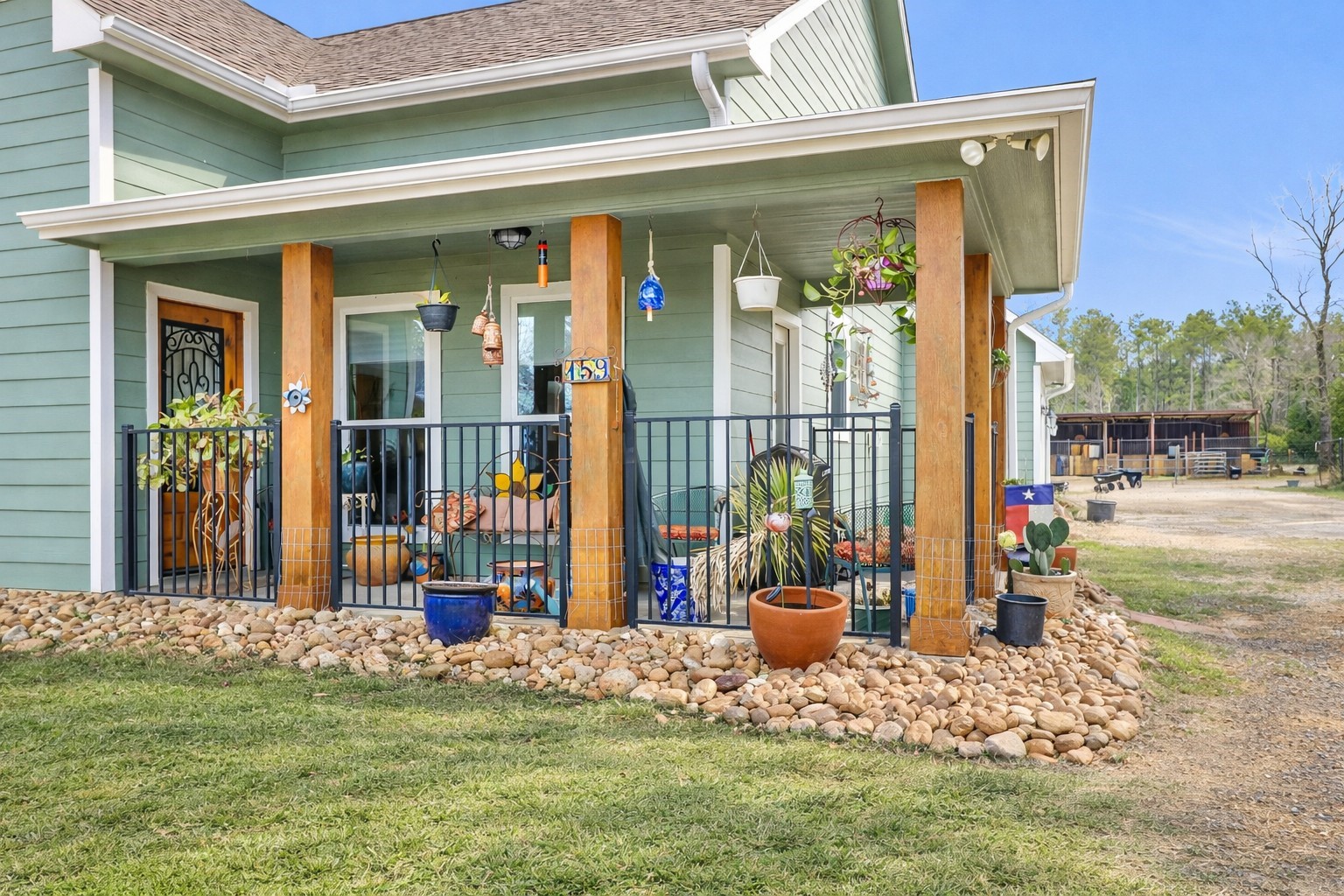 159 East Double Crk Road Willis, TX 77378 - Photo 4 of 40 Digitally edited to show spring-like landscaping.