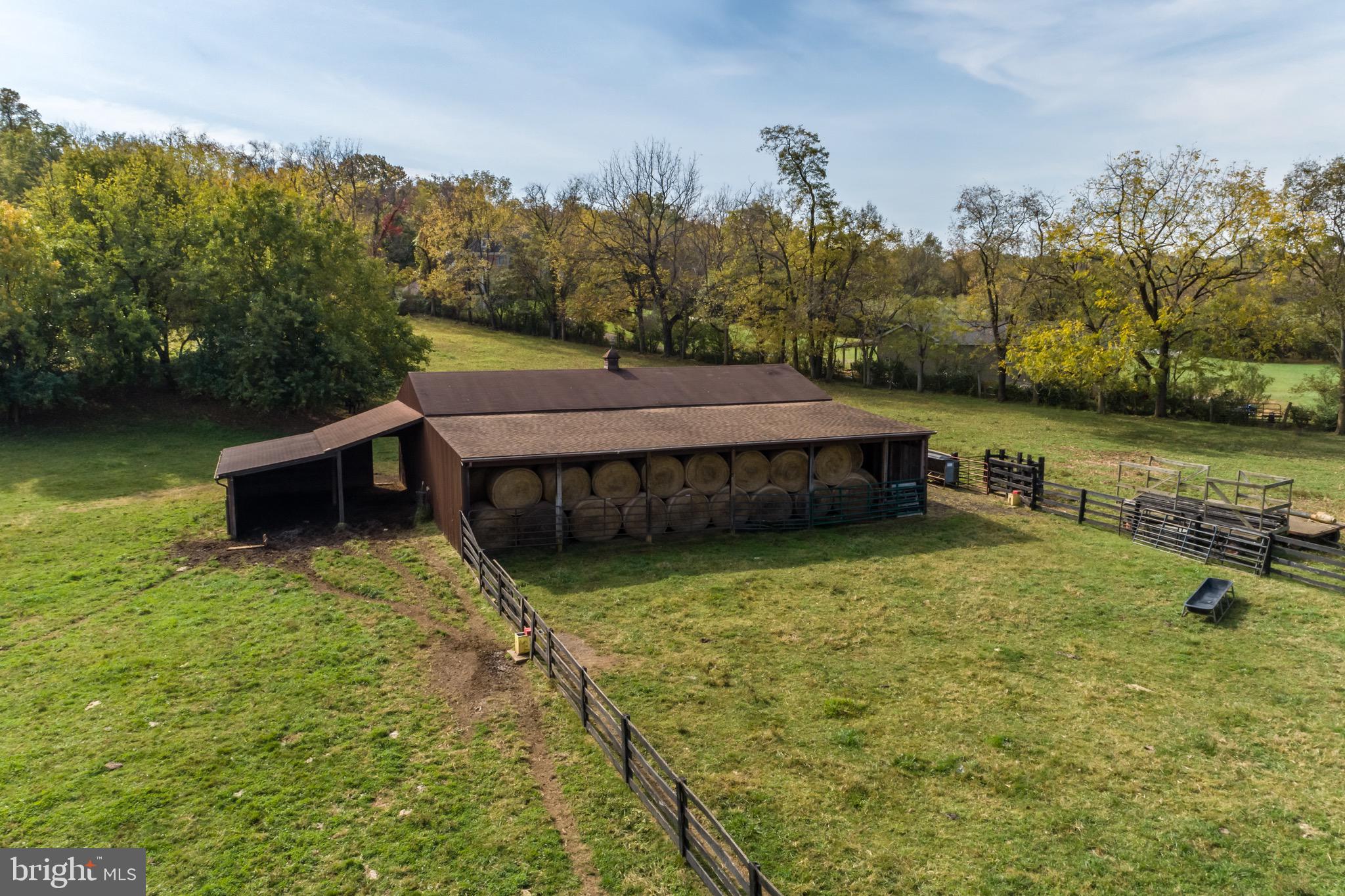 360 Glendobbin Road Winchester, VA 22603 - Photo 71 of 77 View of the corral; hay storage