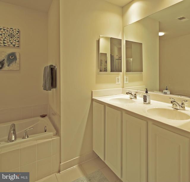 9131 Ribbon Falls Loop Bristow, VA 20136 - Photo 12 of 30 Dual Vanities