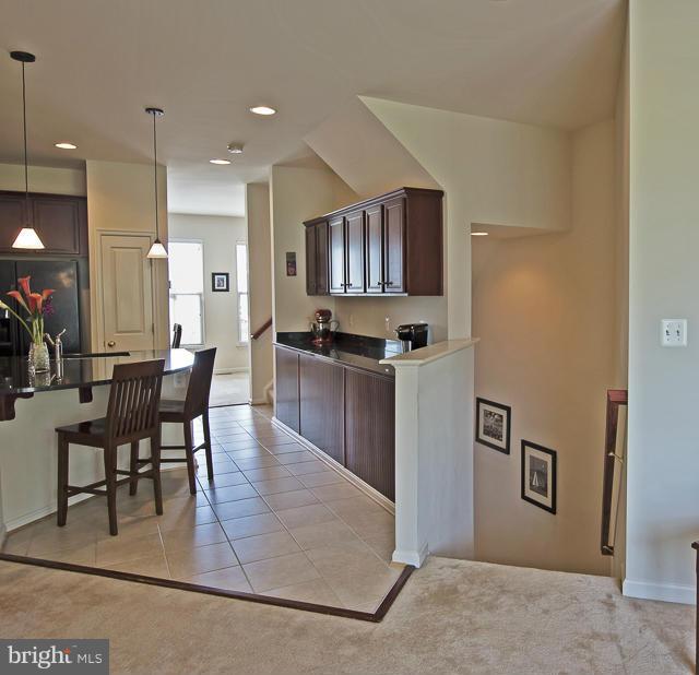 9131 Ribbon Falls Loop Bristow, VA 20136 - Photo 6 of 30 View looking into Kitchen from Living room