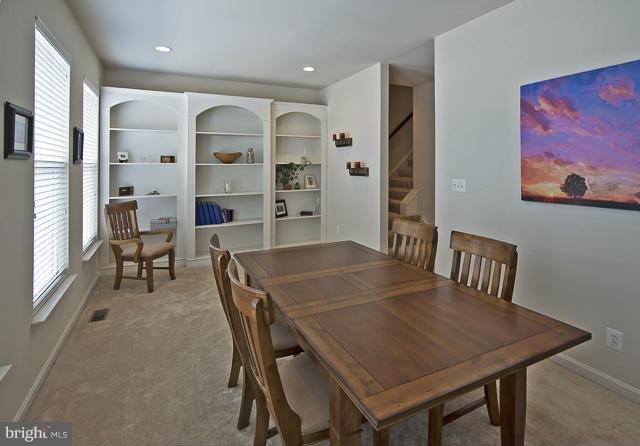 9131 Ribbon Falls Loop Bristow, VA 20136 - Photo 9 of 30 Custom built in bookcases