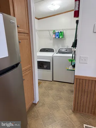 a view of kitchen with washer and dryer
