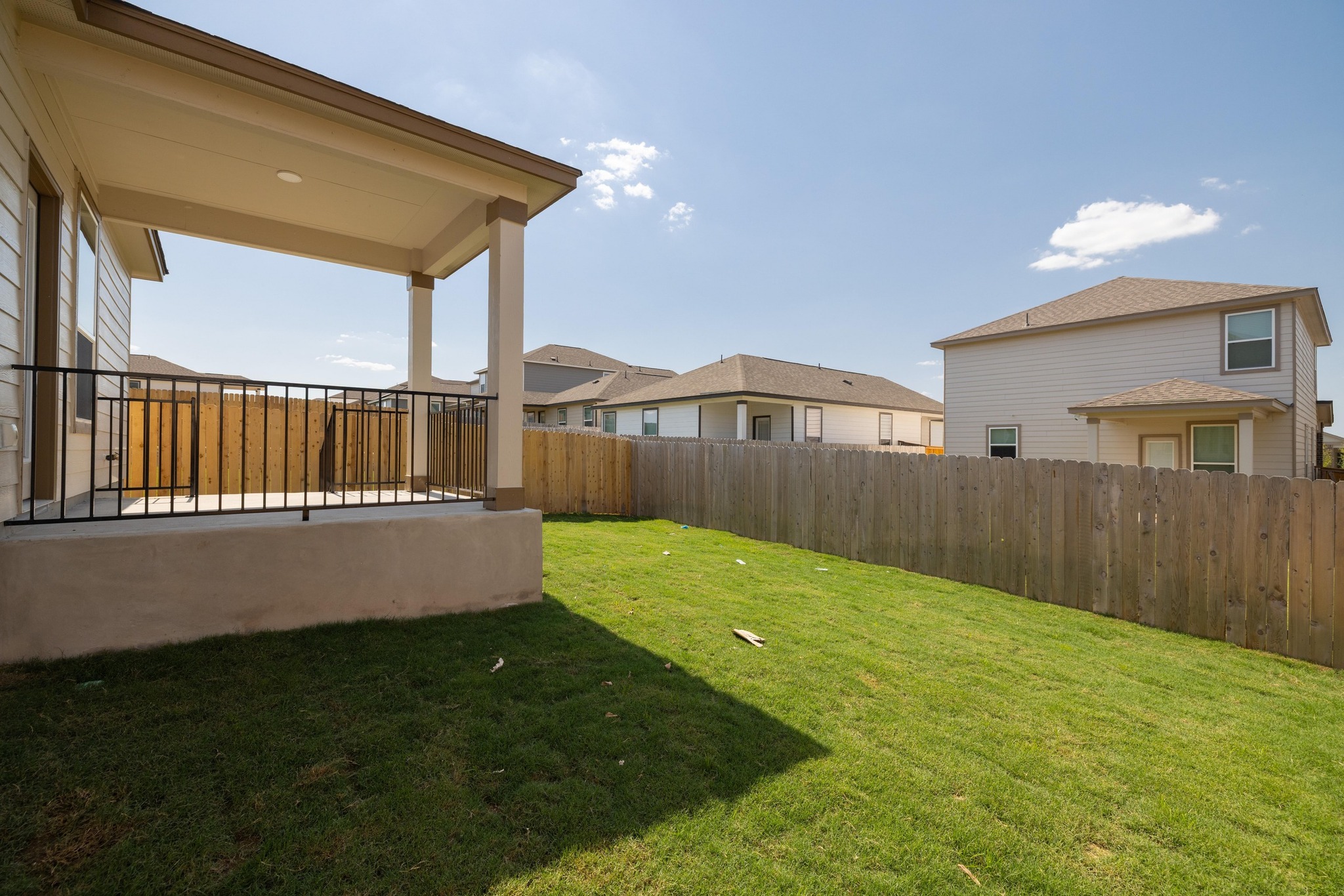 260 Feathers Street Jarrell, TX 76537 - Photo 32 of 34 a view of backyard with hardwood