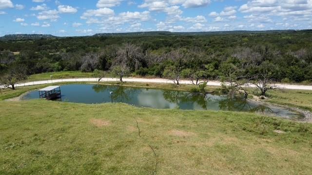 a view of a lake from a yard