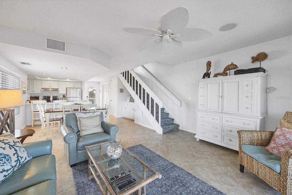 420 Gulf Boulevard, Unit 13 Boca Grande, FL 33921 - Photo 11 of 36 a living room with furniture and a view of kitchen