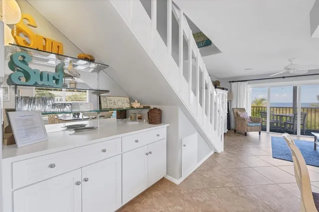 a hallway with cabinets