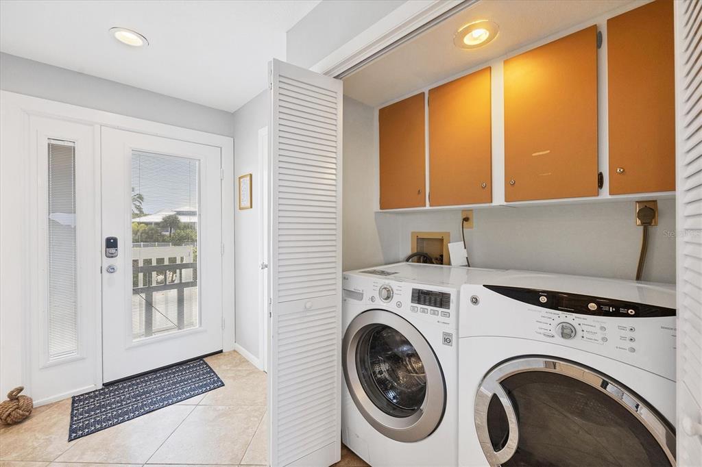 420 Gulf Boulevard, Unit 13 Boca Grande, FL 33921 - Photo 31 of 36 a view of room with washer and dryer