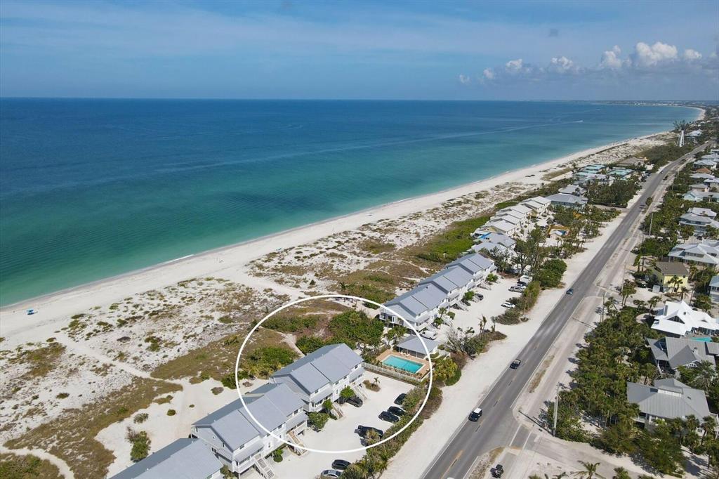 420 Gulf Boulevard, Unit 13 Boca Grande, FL 33921 - Photo 36 of 36 a view of an ocean from a balcony