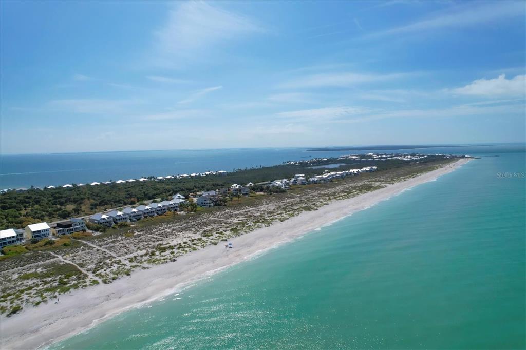 420 Gulf Boulevard, Unit 13 Boca Grande, FL 33921 - Photo 7 of 36 an aerial view of a city