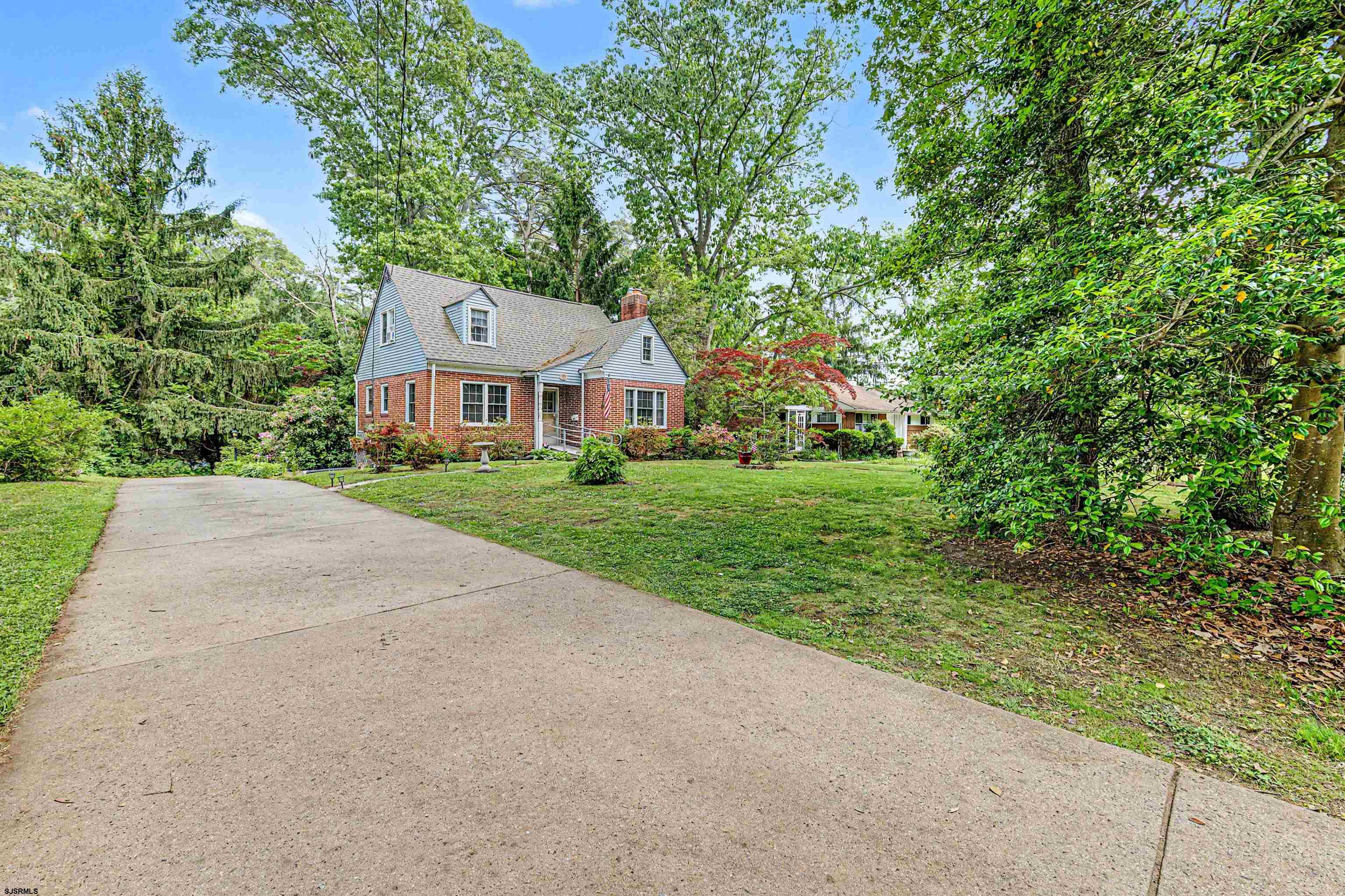 144 Pitney Road Absecon, NJ 08201 - Photo 46 of 47 a front view of a house with a yard
