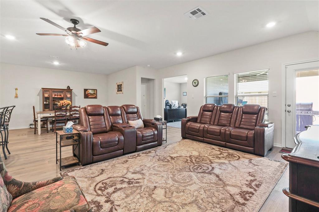 742 Buttercup Drive Pilot Point, TX 76258 - Photo 4 of 20 Living area featuring recessed lighting, light wood-style floors, and ceiling fan