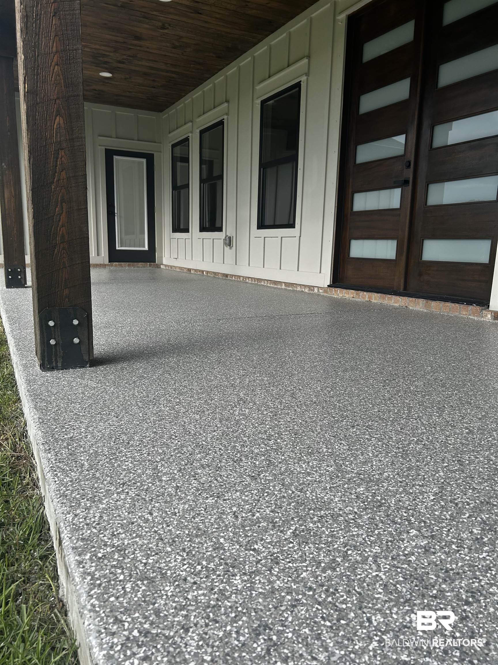 13066 Gopher Court Elberta, AL 36530 - Photo 35 of 38 Expansive covered porch featuring a speckled gray epoxy finish