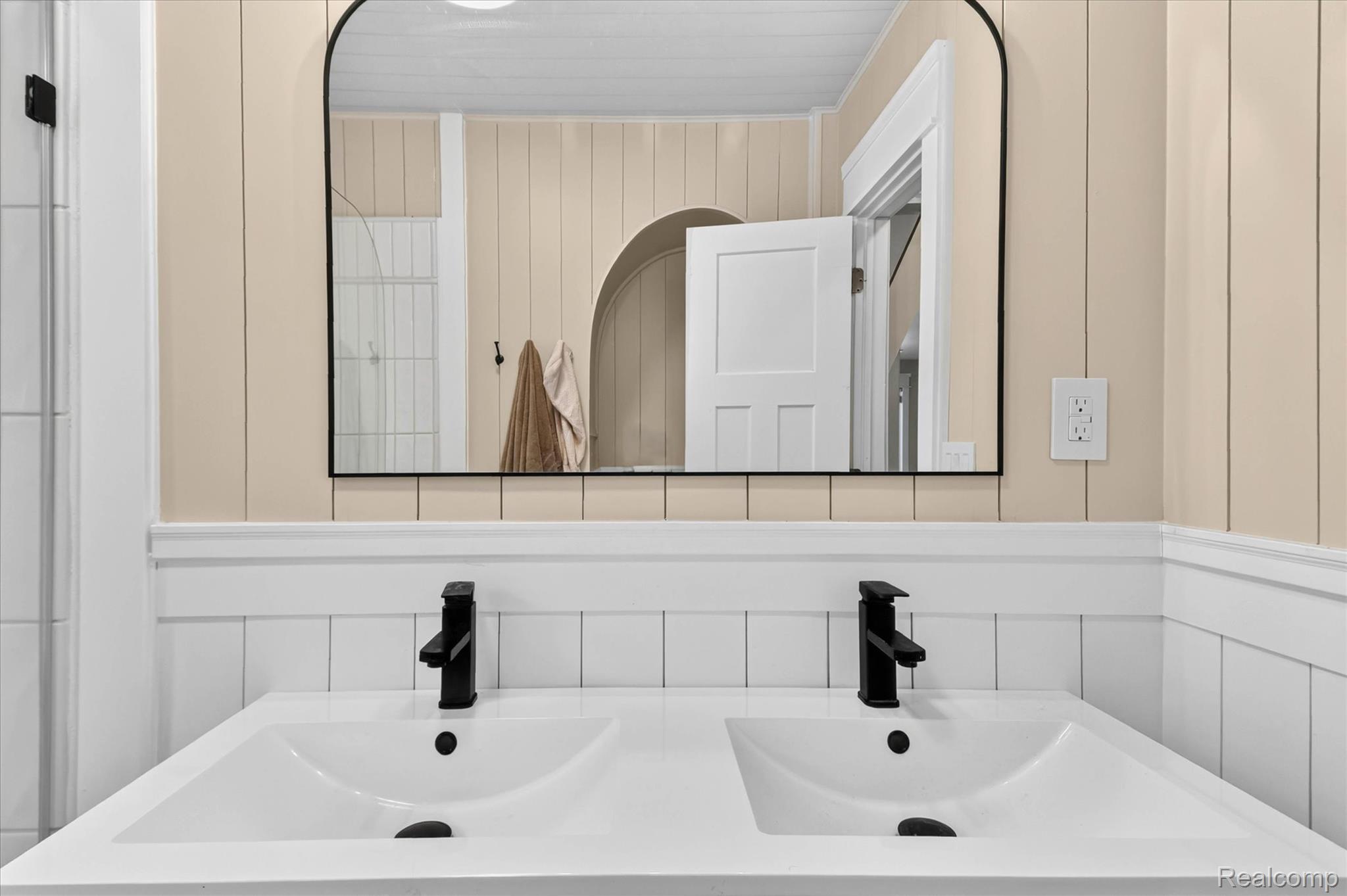 3550 Myrtle Road Fort Gratiot, MI 48059 - Photo 23 of 51 Double vanity and a contemporary arched mirror