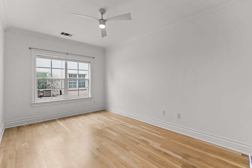 1609 Hartford Road, Unit A Austin, TX 78703 - Photo 35 of 39 Blonde wood floors extend throughout this naturally lit room, ready for your personal touch.