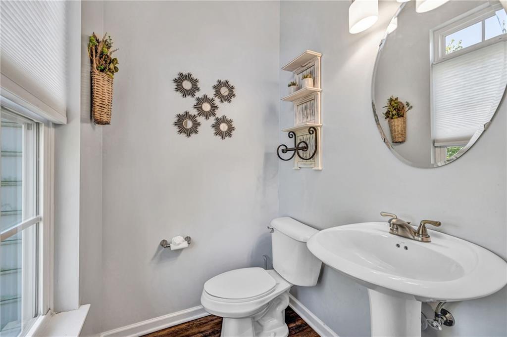 204 Hounslow Road Cranberry Township, PA 16066 - Photo 13 of 24 a bathroom with a sink mirror and toilet