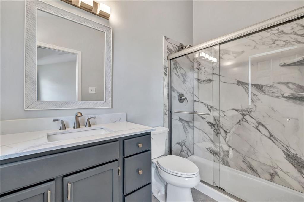 204 Hounslow Road Cranberry Township, PA 16066 - Photo 22 of 24 a bathroom with a sink toilet and shower