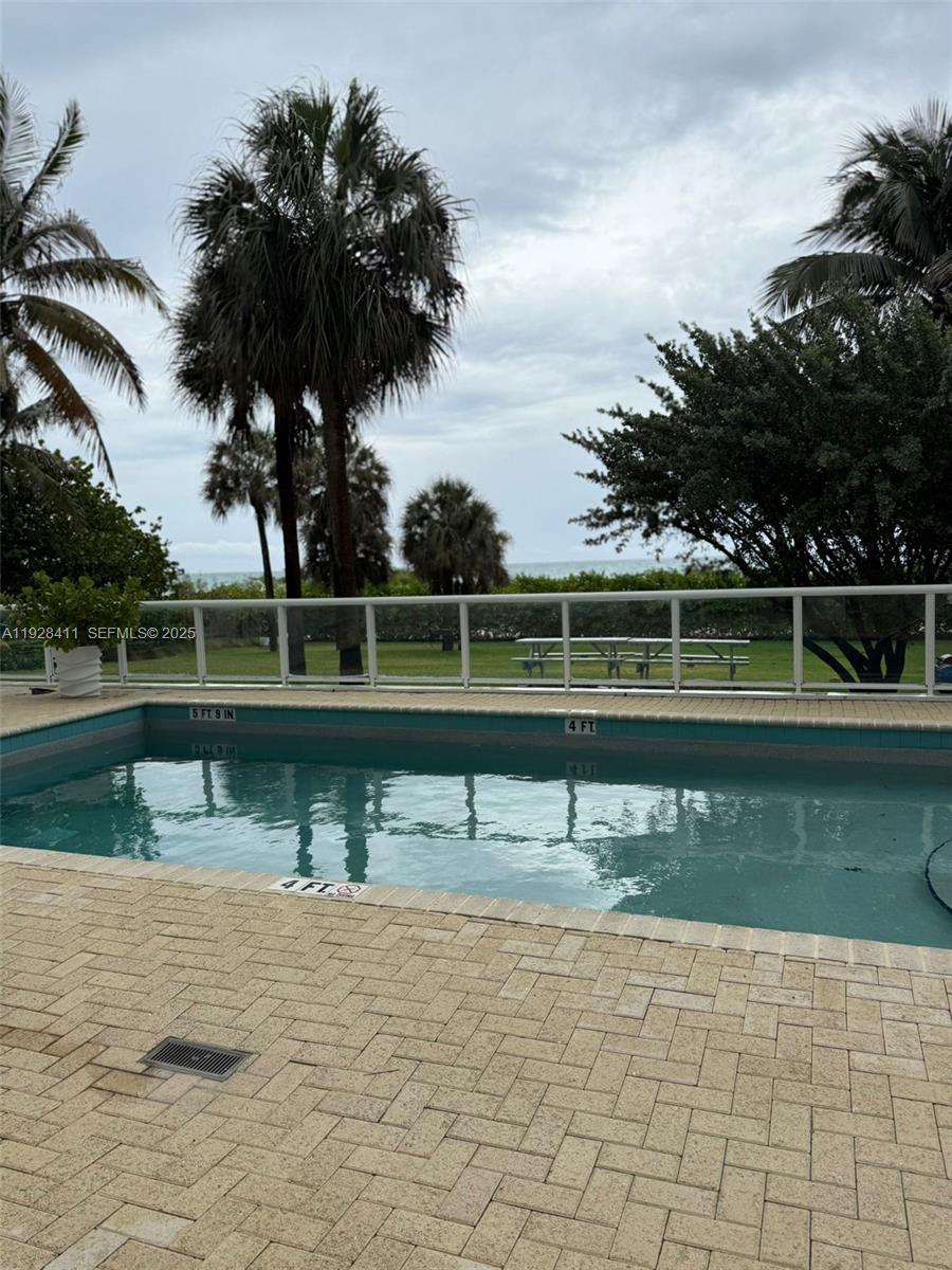 8911 Collins Avenue, Unit 1103 Surfside, FL 33154 - Photo 14 of 19 a view of a lake