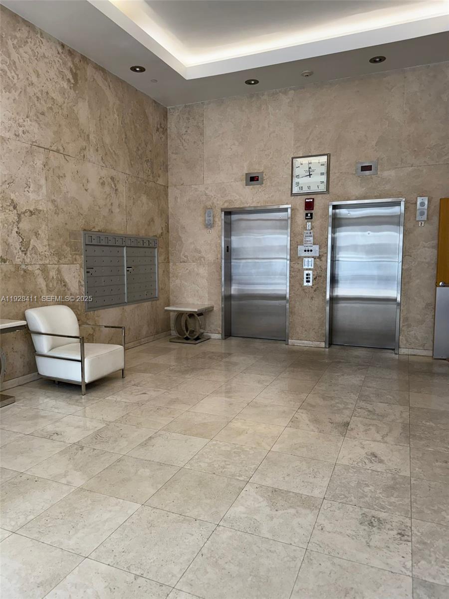 8911 Collins Avenue, Unit 1103 Surfside, FL 33154 - Photo 15 of 19 a view of a livingroom with furniture and natural light