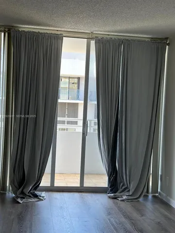a bathroom with a sink a mirror and a bathtub