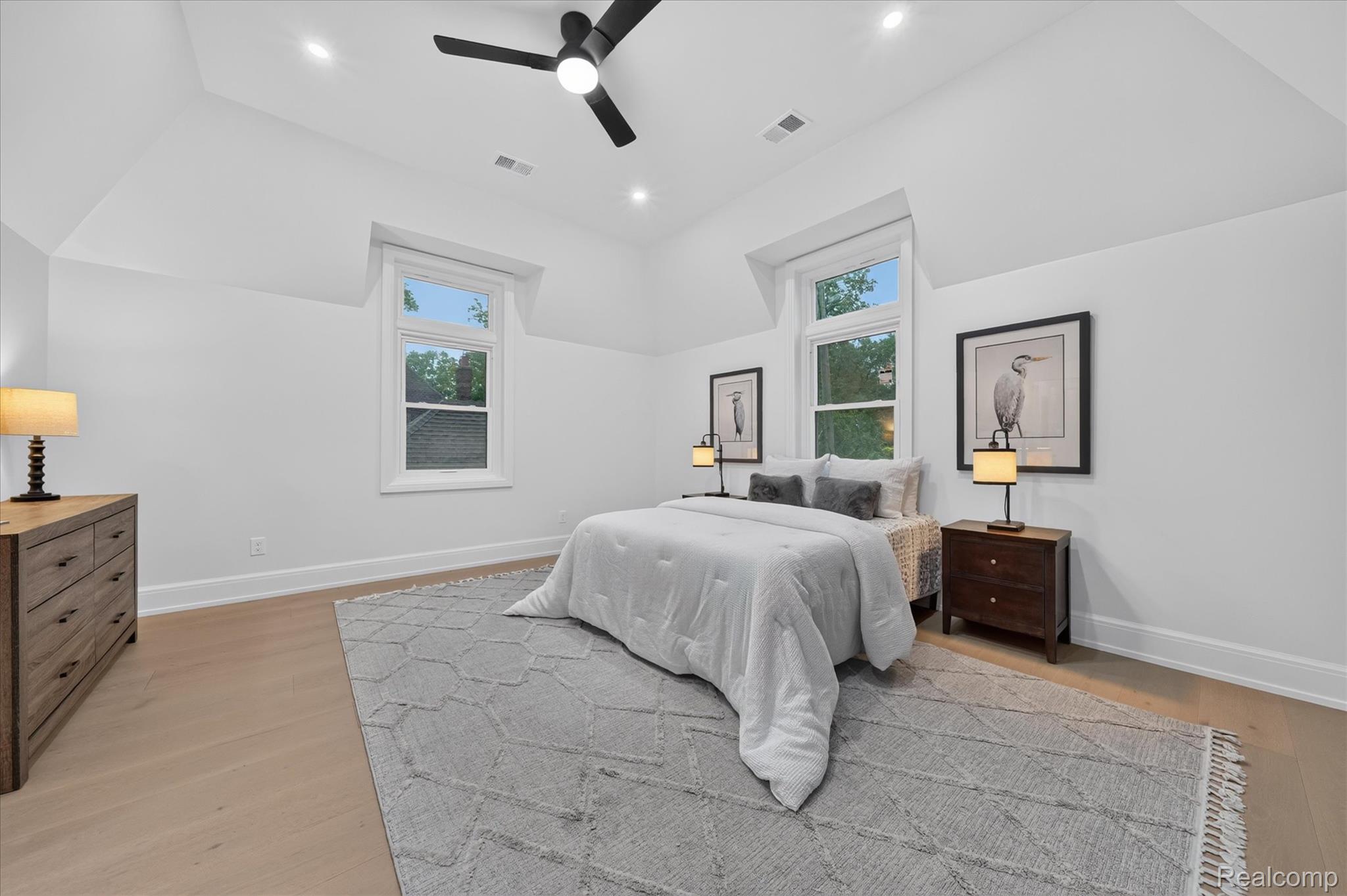 3250 Sherbourne Road Detroit, MI 48221 - Photo 17 of 36 Vaulted ceiling with a ceiling fan, recessed lighting, and wood-finish flooring