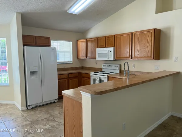 $2,100 | 911 Le Baron Street Southwest, Palm Bay, FL 32908