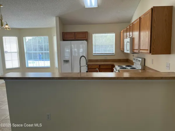 $2,100 | 911 Le Baron Street Southwest, Palm Bay, FL 32908