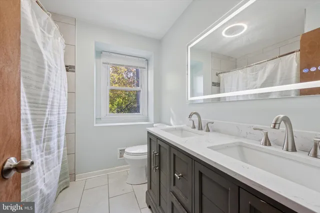 a bathroom with a sink and a toilet
