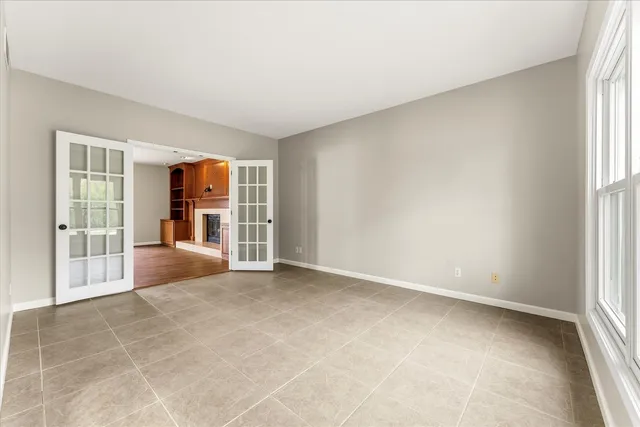 a bathroom with a double vanity sink toilet and shower