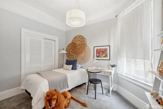 a bathroom with a bathtub sink and mirror