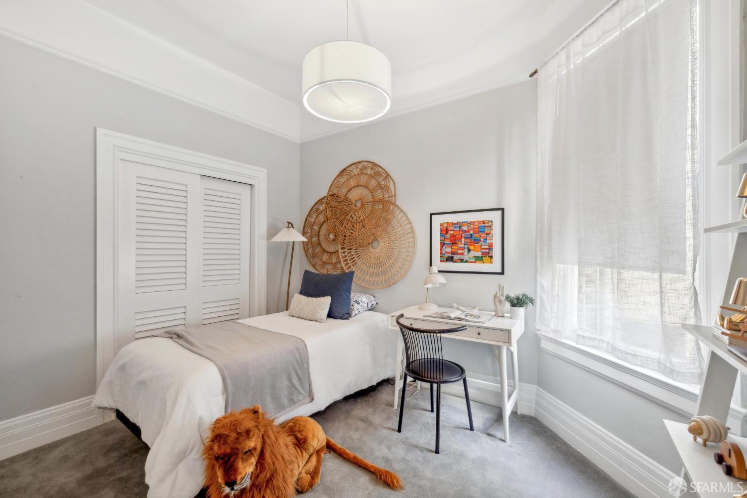 2344 Franklin Street San Francisco, CA 94123 - Photo 18 of 31 a bedroom with a bed and a window