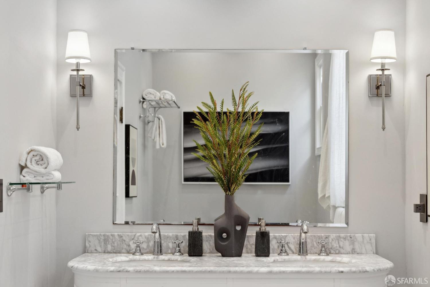 2344 Franklin Street San Francisco, CA 94123 - Photo 21 of 31 a bathroom with a double vanity sink and a mirror