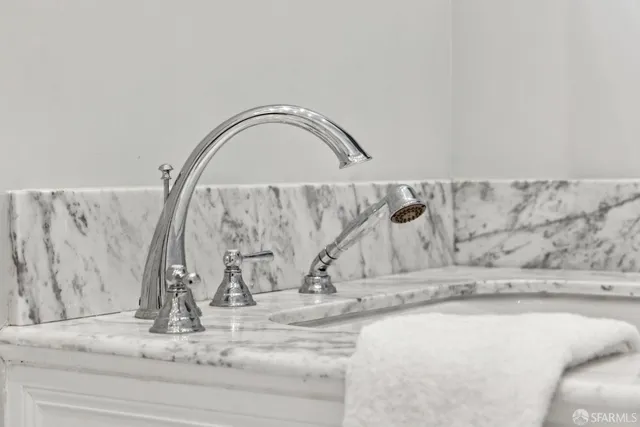 a view of a balcony with chairs