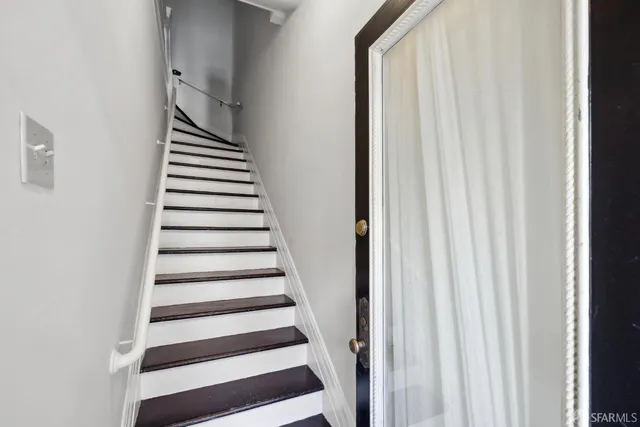 a living room with furniture and rug