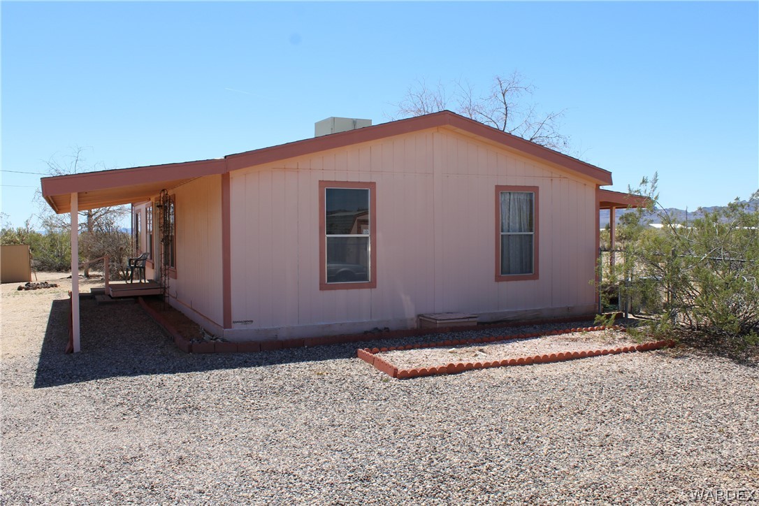 4197 Cordes Road Golden Valley, AZ 86413 - Photo 36 of 51 a backyard of a house