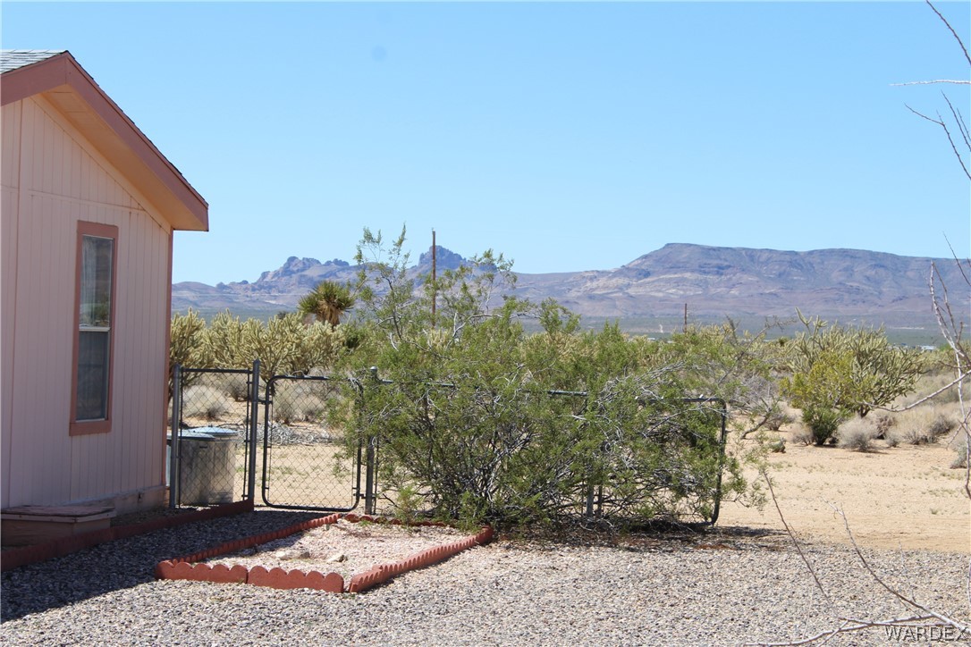 4197 Cordes Road Golden Valley, AZ 86413 - Photo 38 of 51 a view of a backyard