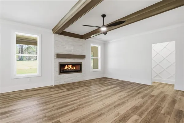 a kitchen with stainless steel appliances kitchen island a sink stove and refrigerator