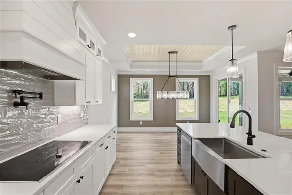 a view of livingroom with porch and wooden floor