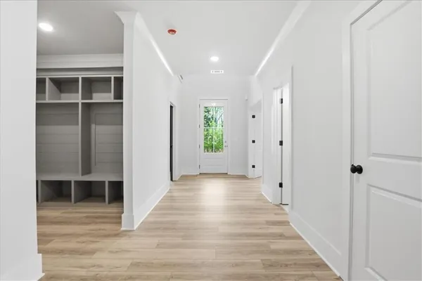 a view of an empty room with a window
