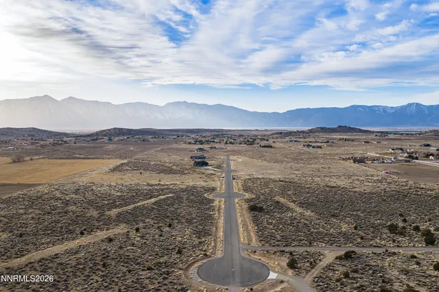 a view of an ocean and a mountain