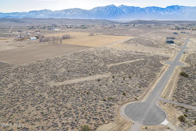 a view of an ocean beach and mountain