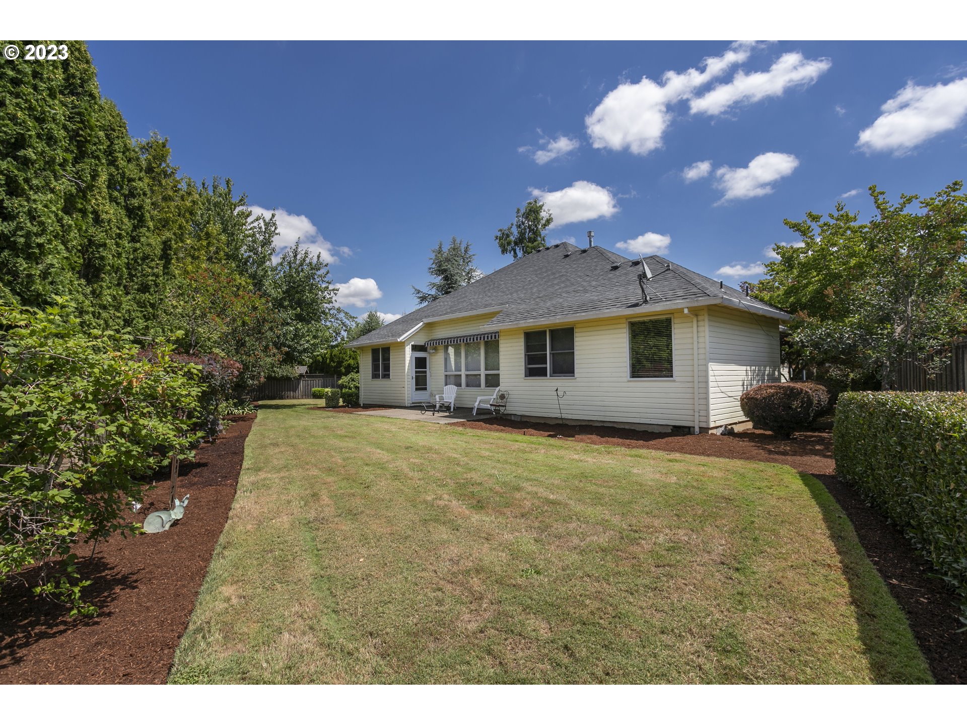 2371 Miller Farm Road Woodburn, OR 97071 - Photo 11 of 33 a view of a house with backyard and sitting area
